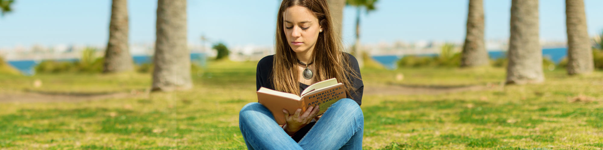 Woman Reading Outdoors